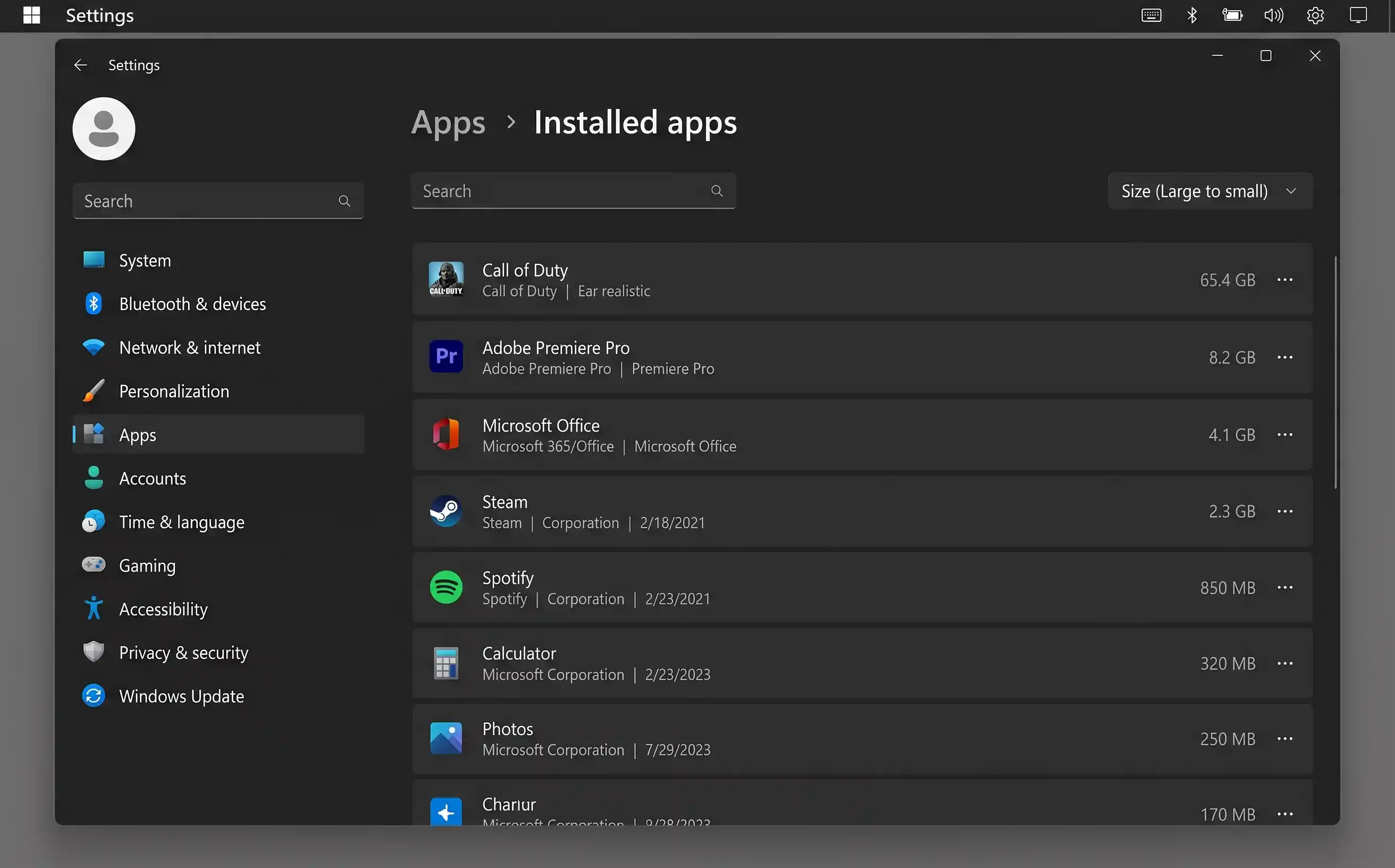 Downloads folder sorted by date showing old installer files and duplicate documents ready to be deleted