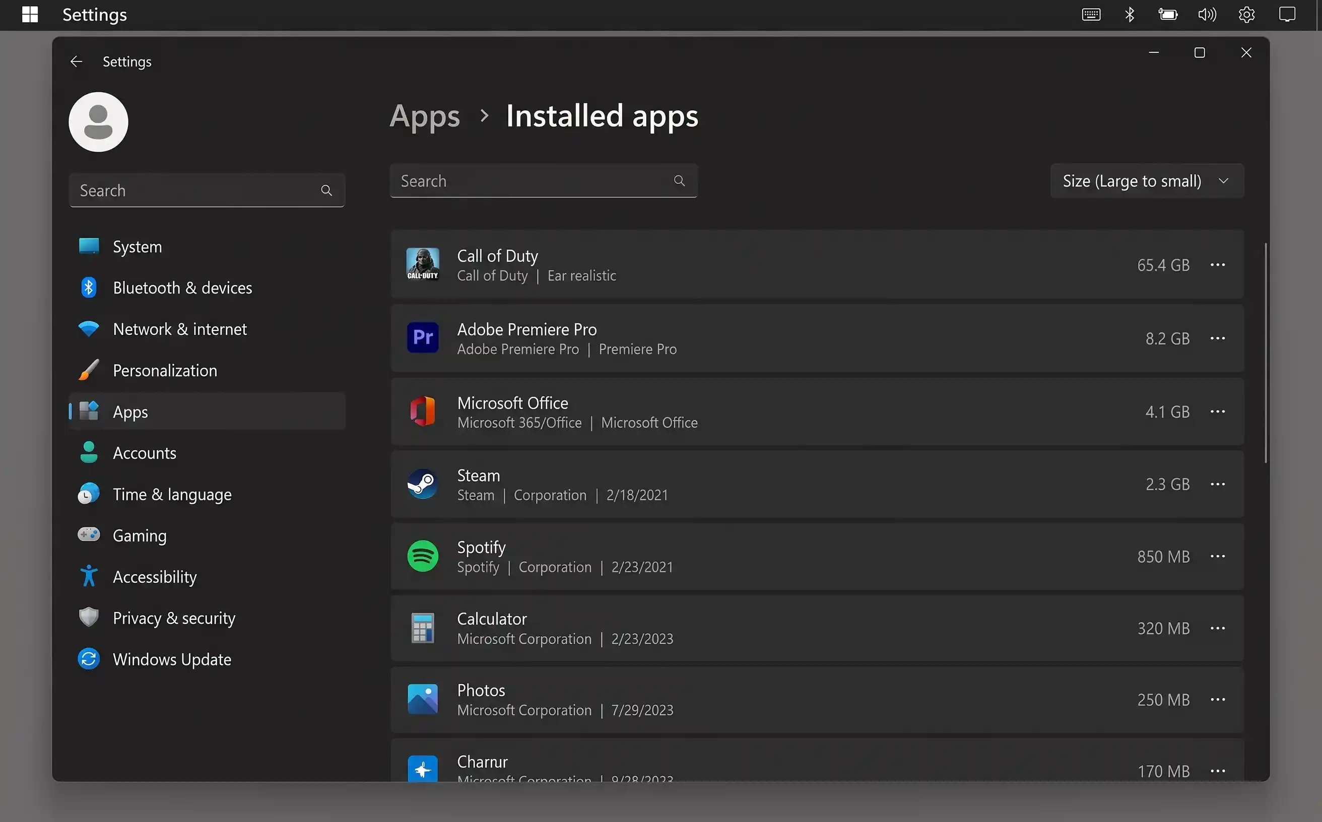 Windows 11 Settings showing Installed apps list sorted by size with large applications at the top